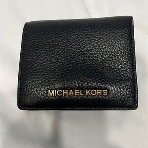 Michael jots wallet